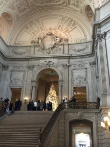 Wedding in front of Christmas tree at San Francisco City Hall